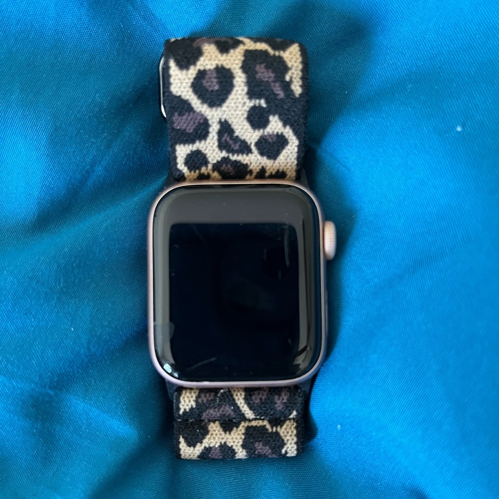 Apple Watch Series 4 with brand new charger.